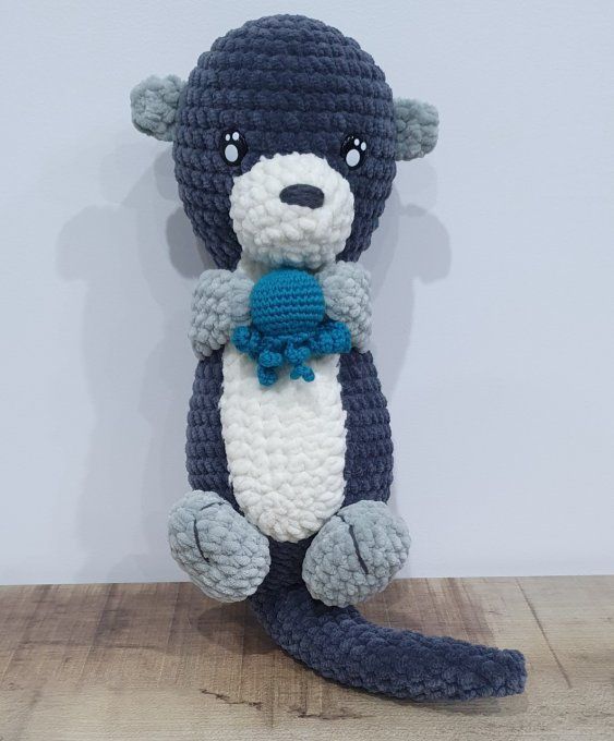 Loutre et son doudou pieuvre
